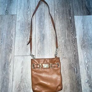 Michael Kors Brown Crossbody Bag with Adjustable Strap and Metal Hardware